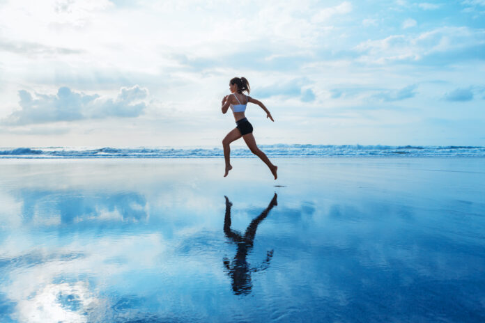 Barefoot,Young,Girl,With,Slim,Body,Running,Along,Sea,Surf